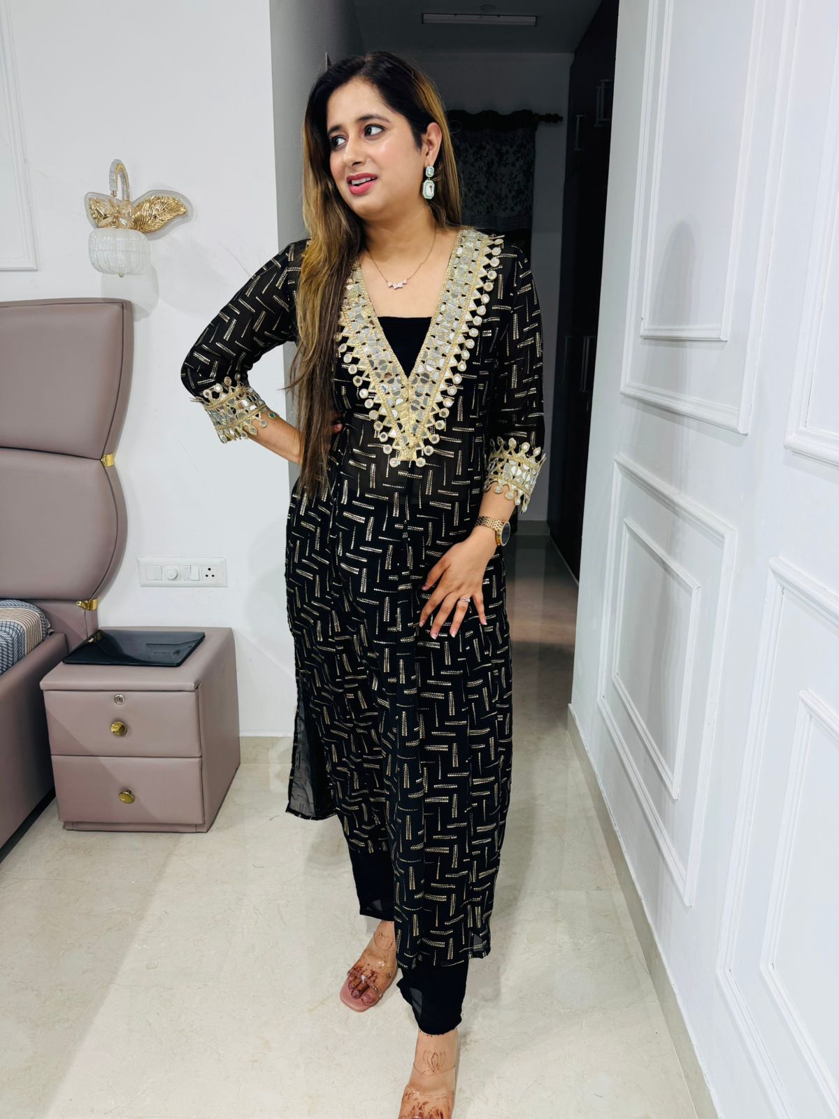 Shanya💫 | Trendy Black and Gold Straight Kurta Set with V-Neck Tassel Detailing