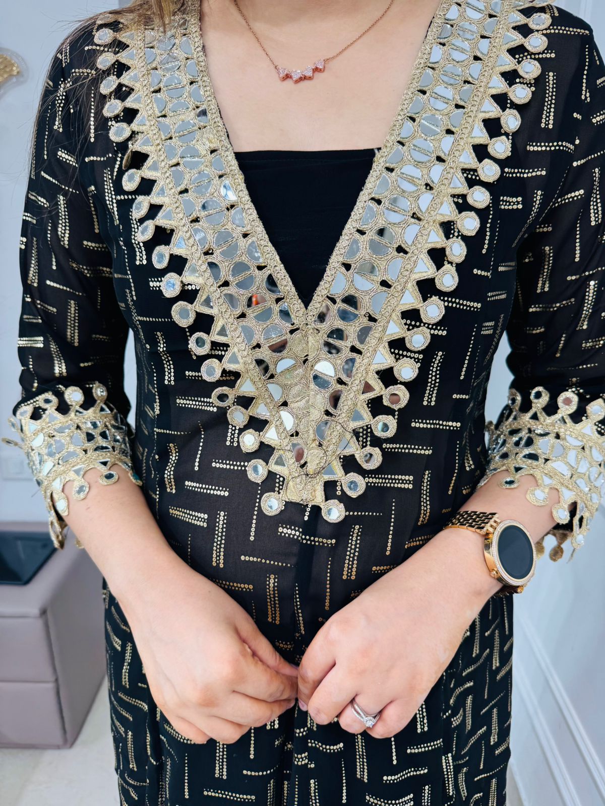 Shanya💫 | Trendy Black and Gold Straight Kurta Set with V-Neck Tassel Detailing