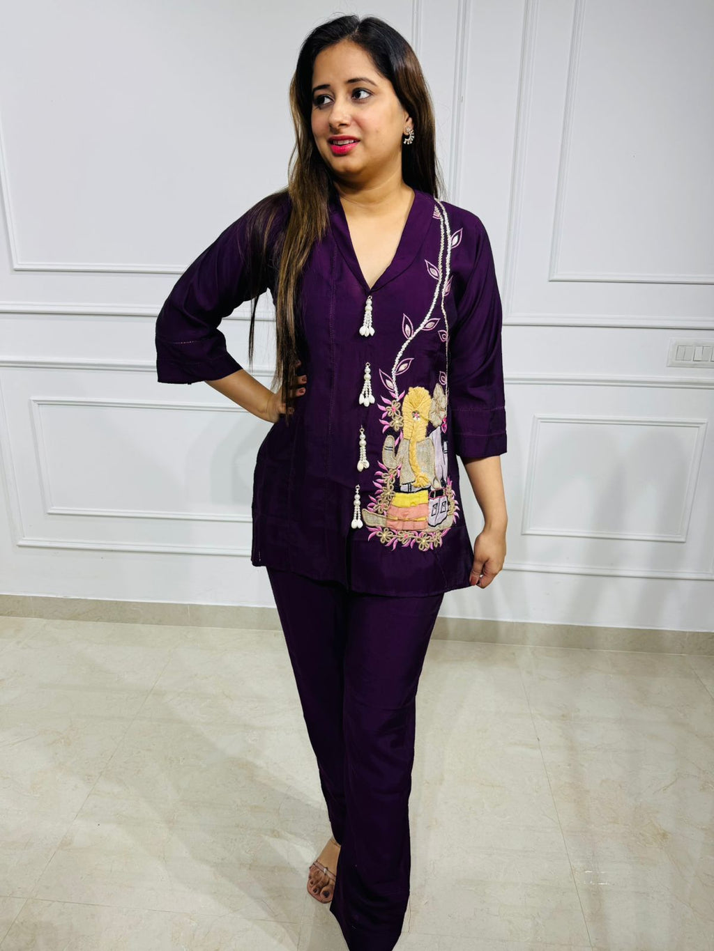 Lila | Plum Muslin Coordset – Hand-Embroidered Krishna Motif, V-Neck Kurta & Straight Pants