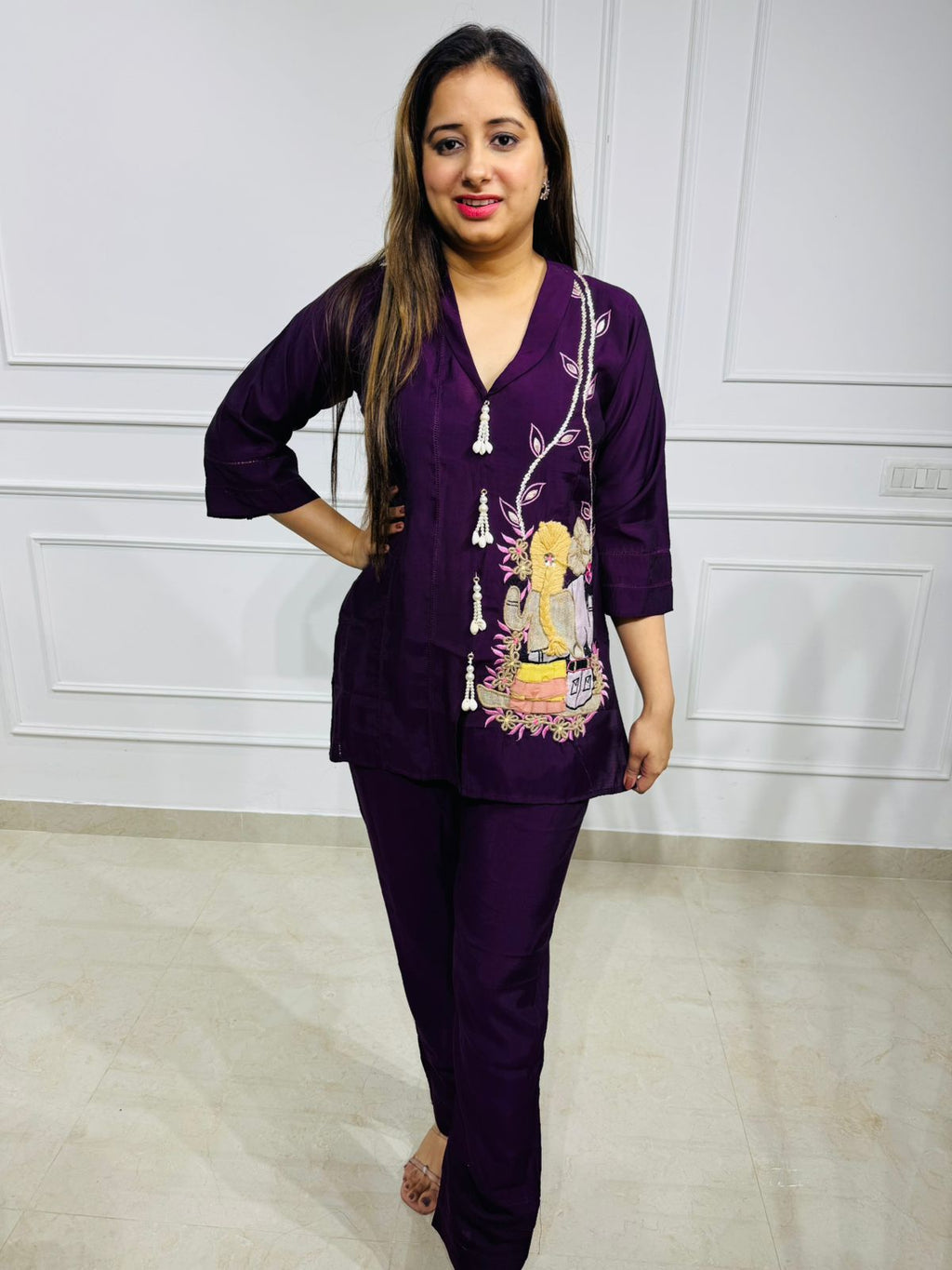 Lila | Plum Muslin Coordset – Hand-Embroidered Krishna Motif, V-Neck Kurta & Straight Pants